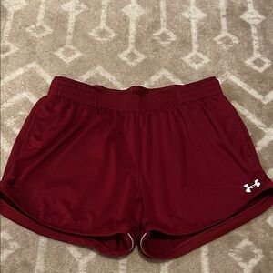 Under Armour Women's Burgundy Athletic Shorts - 4 inch length, size medium.